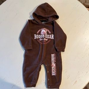 One piece fleece hooded onesie.